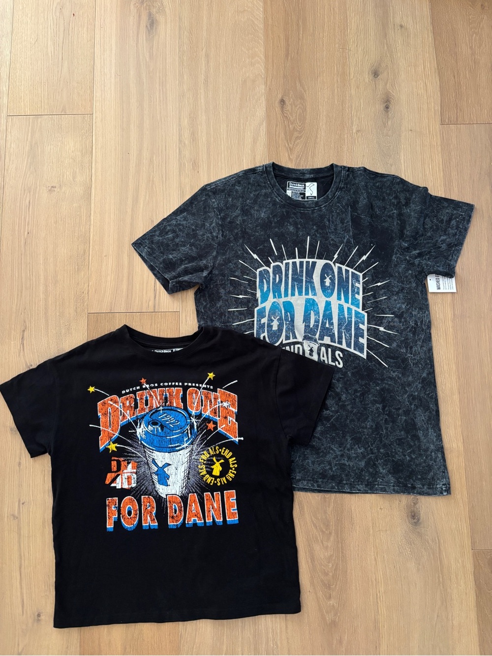 2 NWOT Dutch Bros Drink one for Dane tees